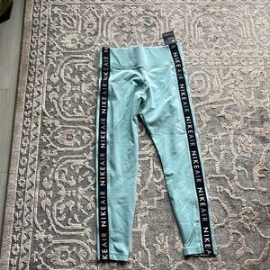 Brand New. Nike Leggings size L. (Fits like a M)